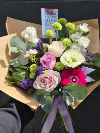 Cool Breeze - This classical stylish collection of flowers, make this hand tied the perfect gift. Flowers professionally arranged and delivered by a local florist.