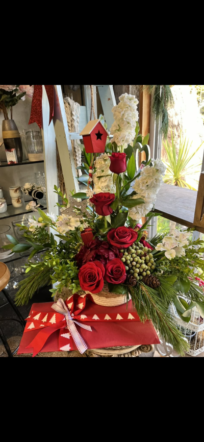 Xmas Magic - A beautiful easy-care tall arrangement with keepsakes throughout